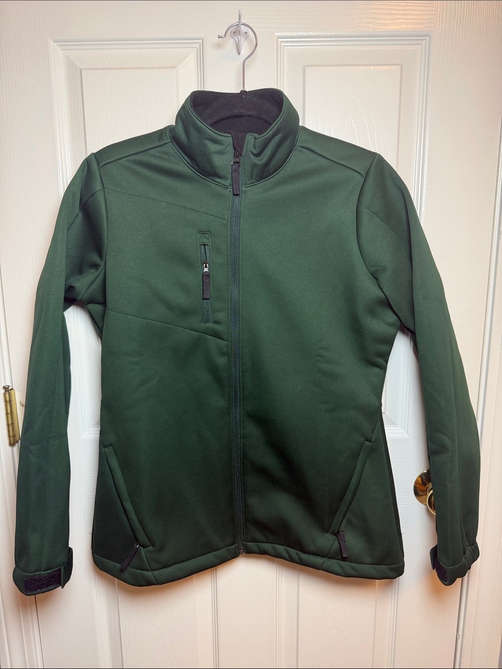 Antigua fall or winter golf jacket in hunter green